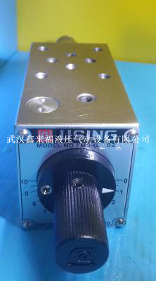 Multilayer electromagnetic flow control valve